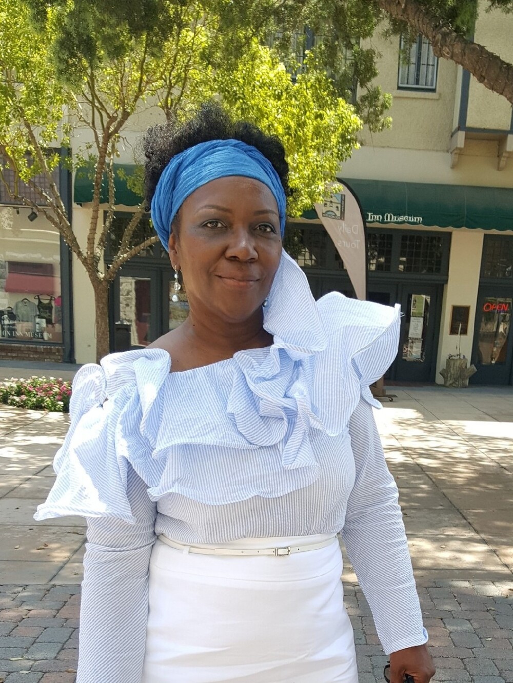 Light Blue Ruffle One-Shoulder Top.